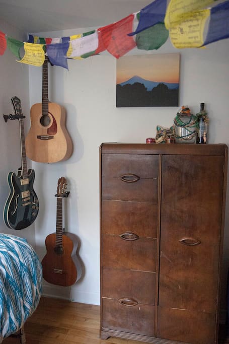 Artdeco wardrobe with hanging space next to my guitar collection.