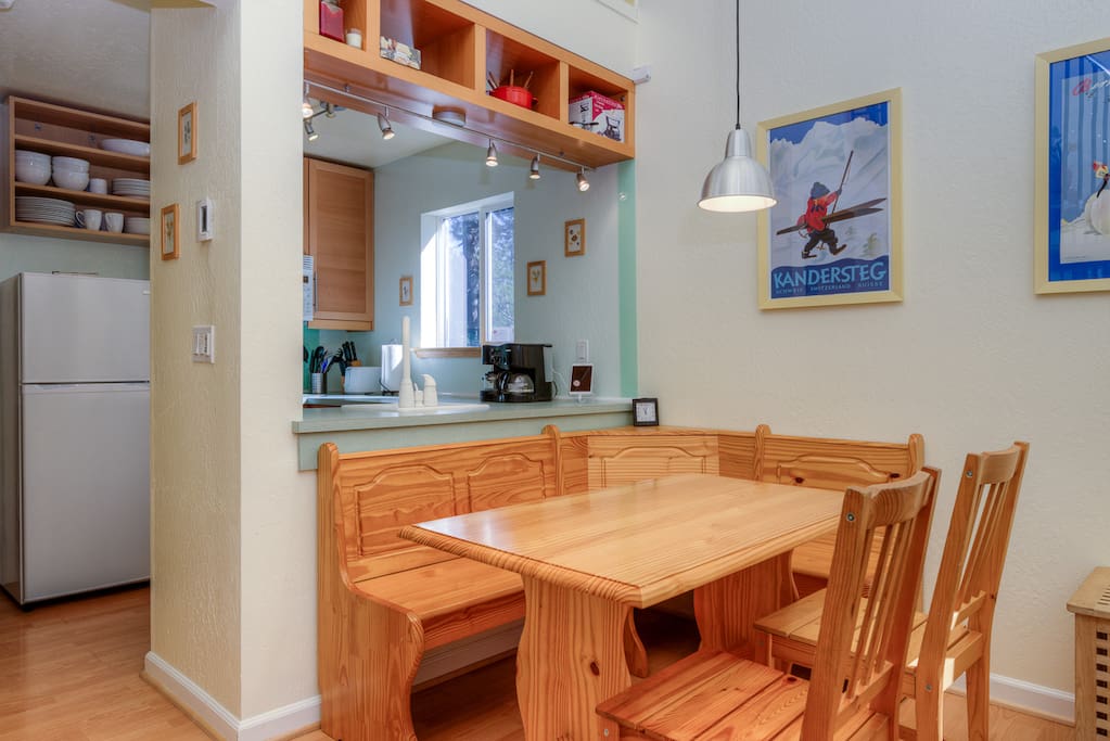 The living room opens out to the dining area and kitchen.