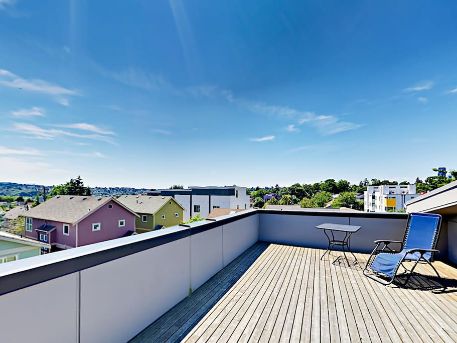 A private rooftop deck offers expansive Seattle views.