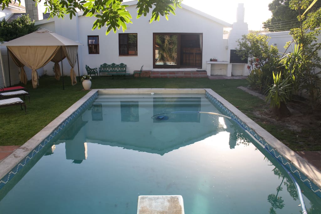 Outside area - deep pool diving board, chill spaces and barbecue