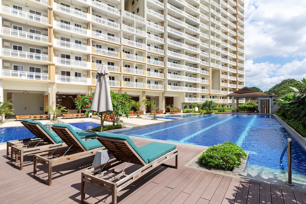 A spectacular and refreshing full view of Tropical Oasis’ kiddie pools and lap pool for adults- a beautiful sight of peace and tranquility...away from “IT” all!