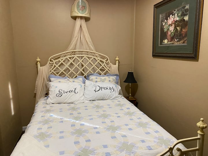 Bedroom 3 Queen size bed, vanity with mirror, night table with lamp