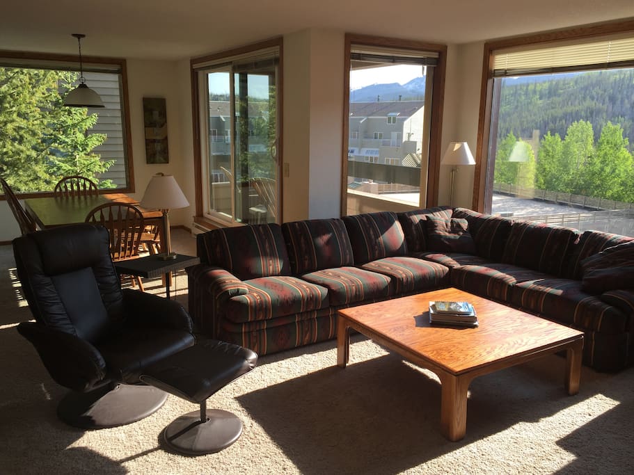 Bright and sunny living room with views of the Continental Divide!