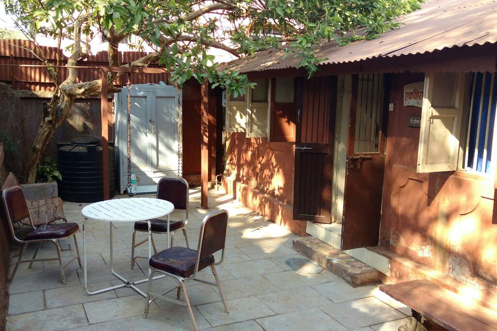 Front compound with seat out, swing and guava tree shade ...