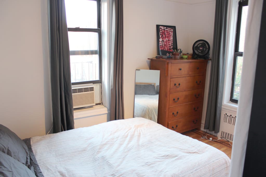 Queen bed side of massive split bedroom.