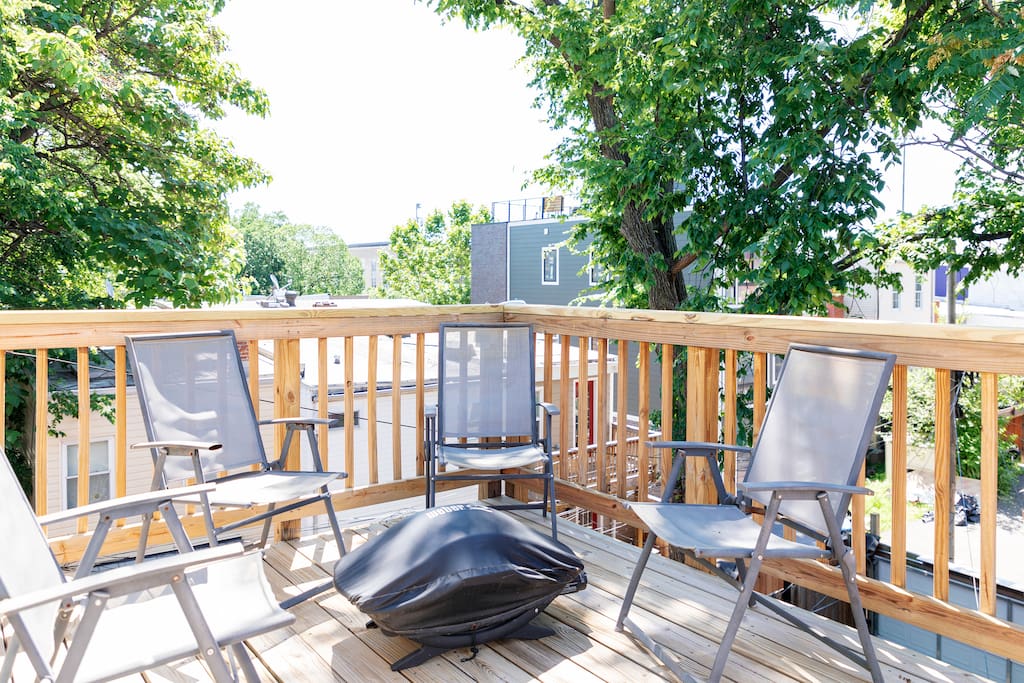 Enjoy the 2nd floor wooden balcony with grill