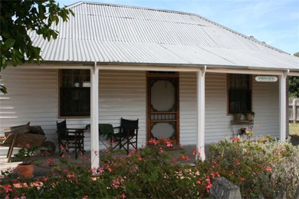 Enjoy a glass of a local Coonawarra wine on the verandah