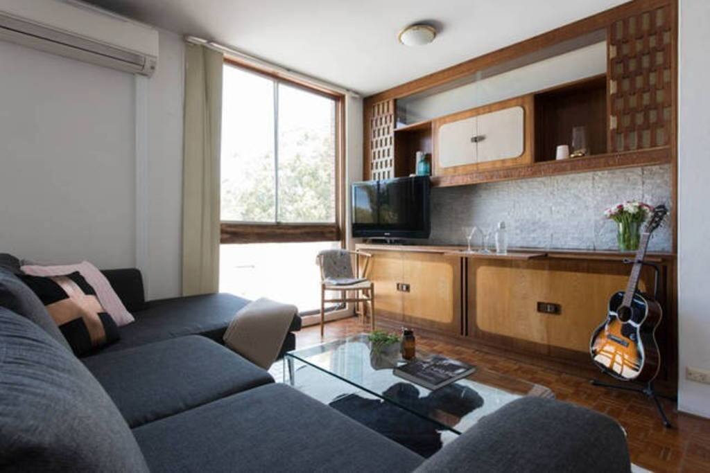 Treat yourself to a cocktail in our mad men style apartment