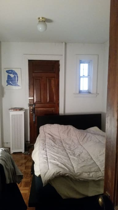 Comfy, private bedroom, with access to backyard.
