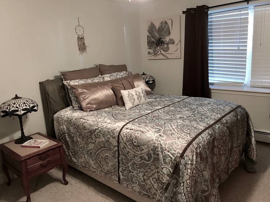 Large bedroom with queen bed.