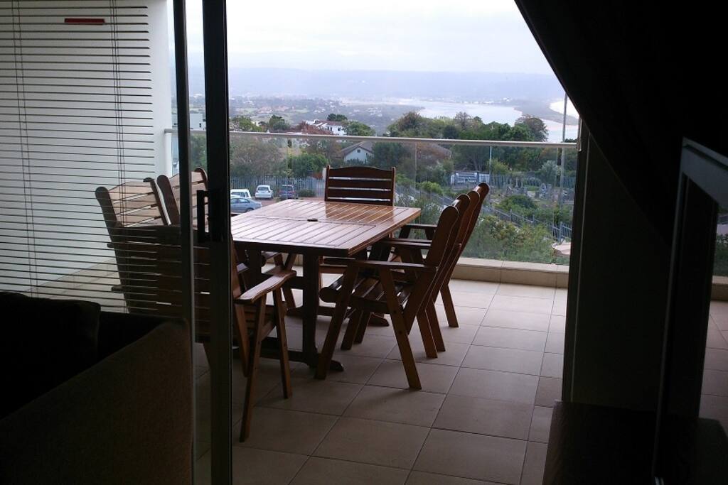 The spacious patio makes the most of the view and includes a built in braai area