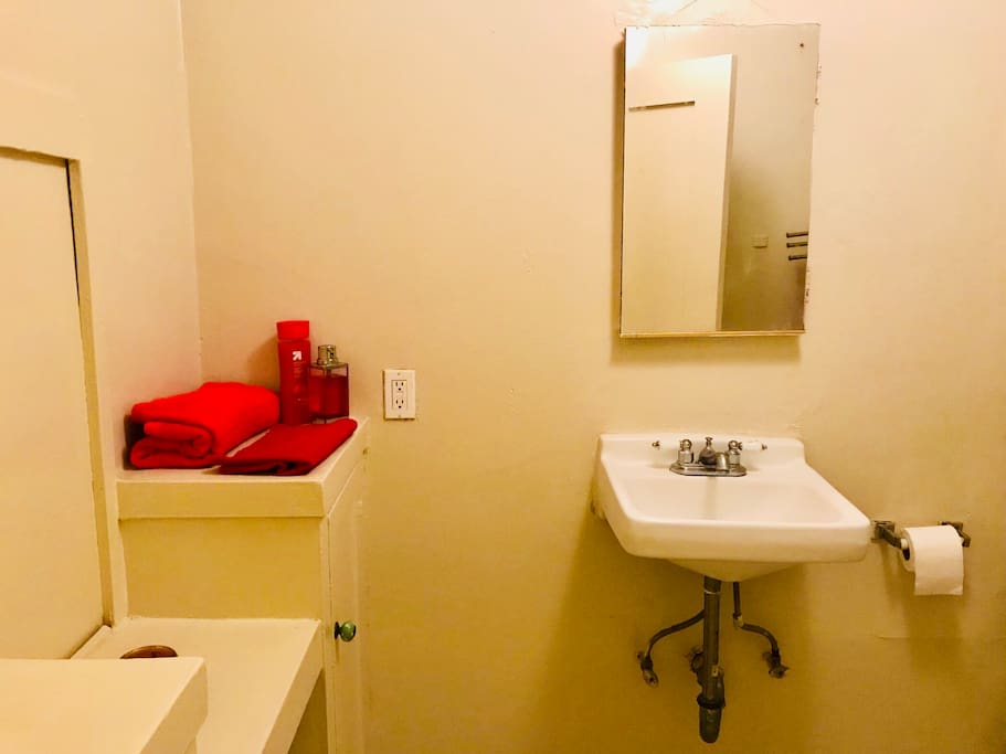 Bathroom, with towels and shower products available