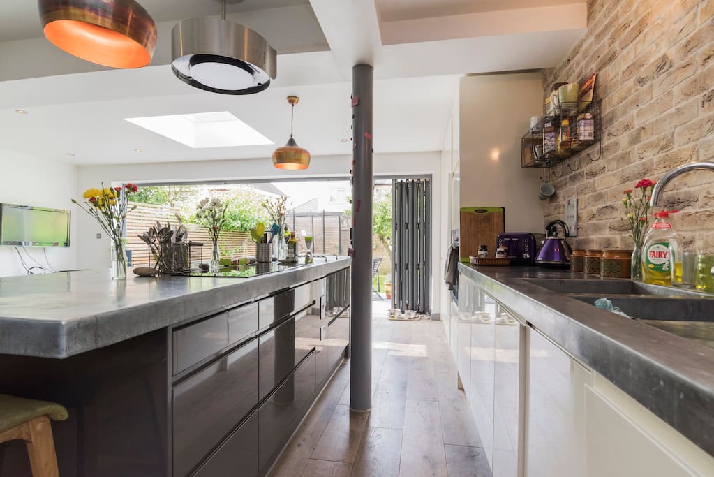 Fully fitted kitchen with cooking equipment