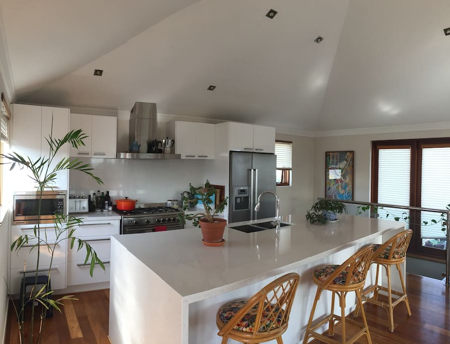 Kitchen with range oven and dishwasher.