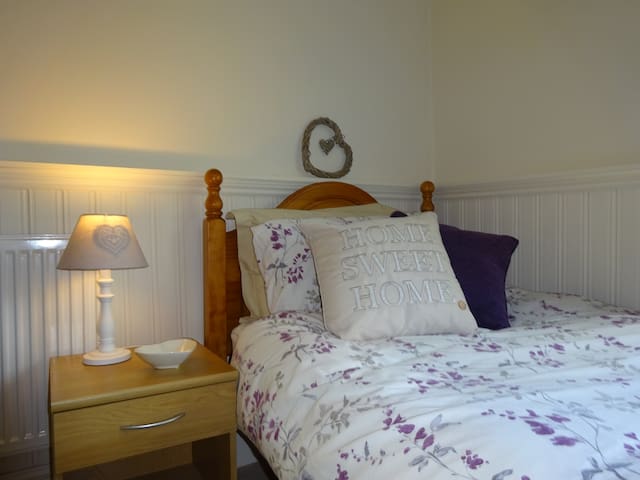 cosy  home surrounded by trees