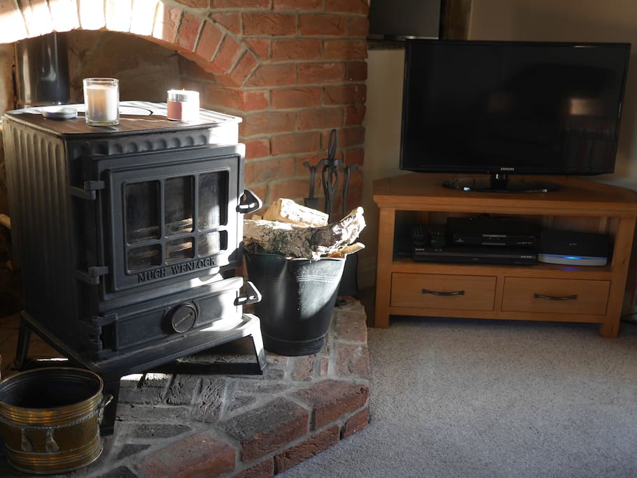 Contrast of the old (stove) and new (HD TV/Internet)