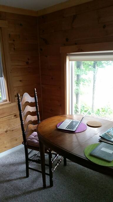 Dining area in front of bay window