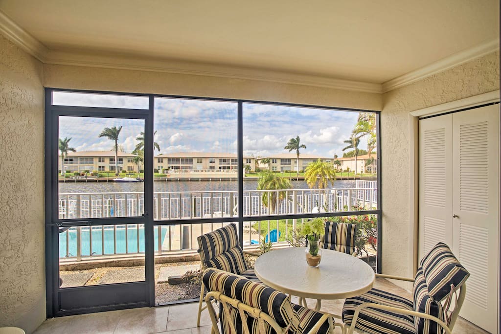 This first-floor, waterfront condo sits on one of the area's largest canals, boasting ample living space and a heated community pool just outside the door!