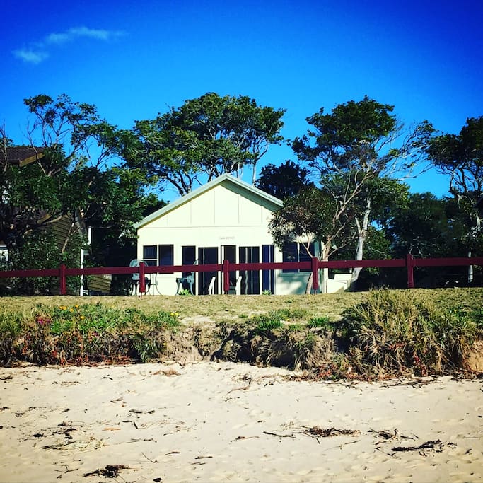 Directly on the beach and North facing