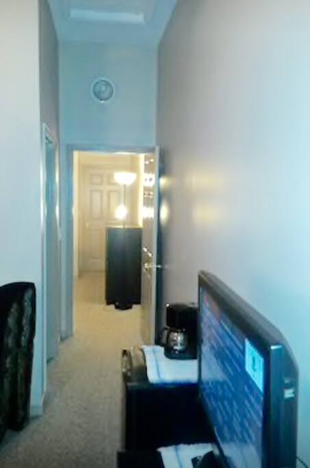 The door in the photo leads to the second bedroom available upon request