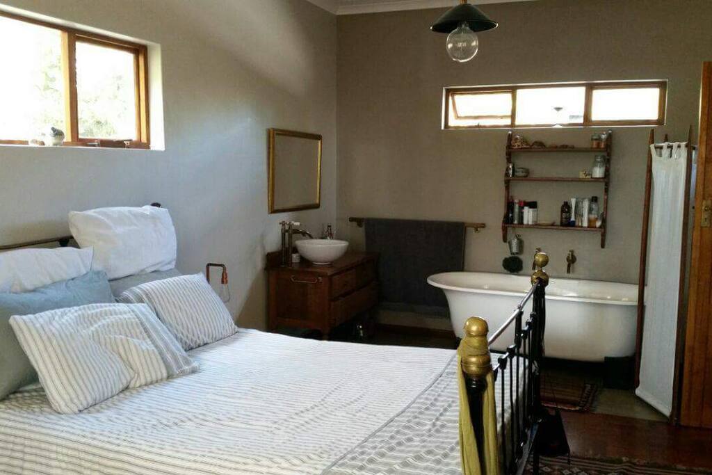 Main bedroom opening onto upstairs deck