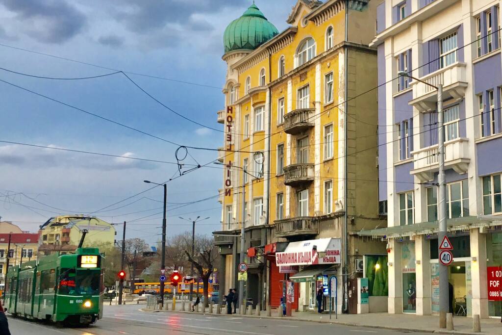 The tram station is right in front of the building