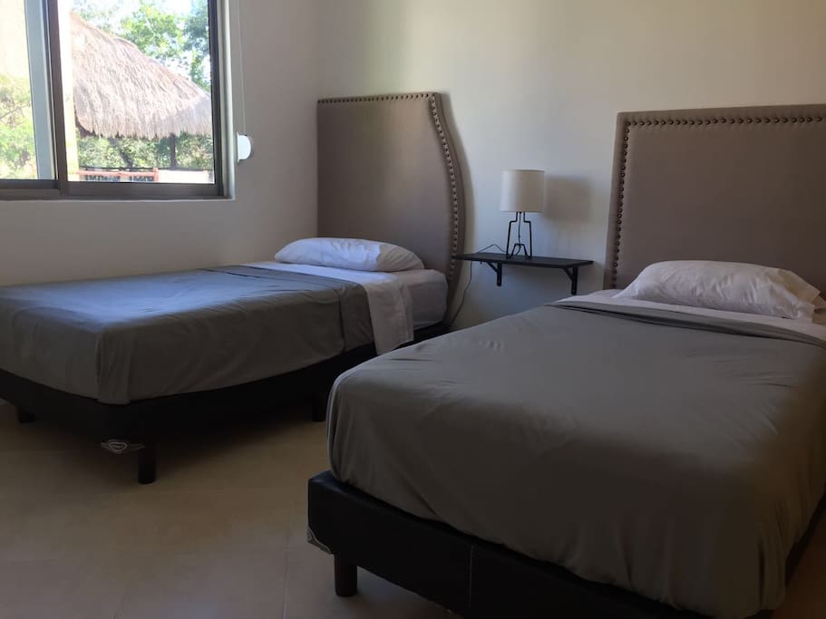 Room 1 with twin beds.