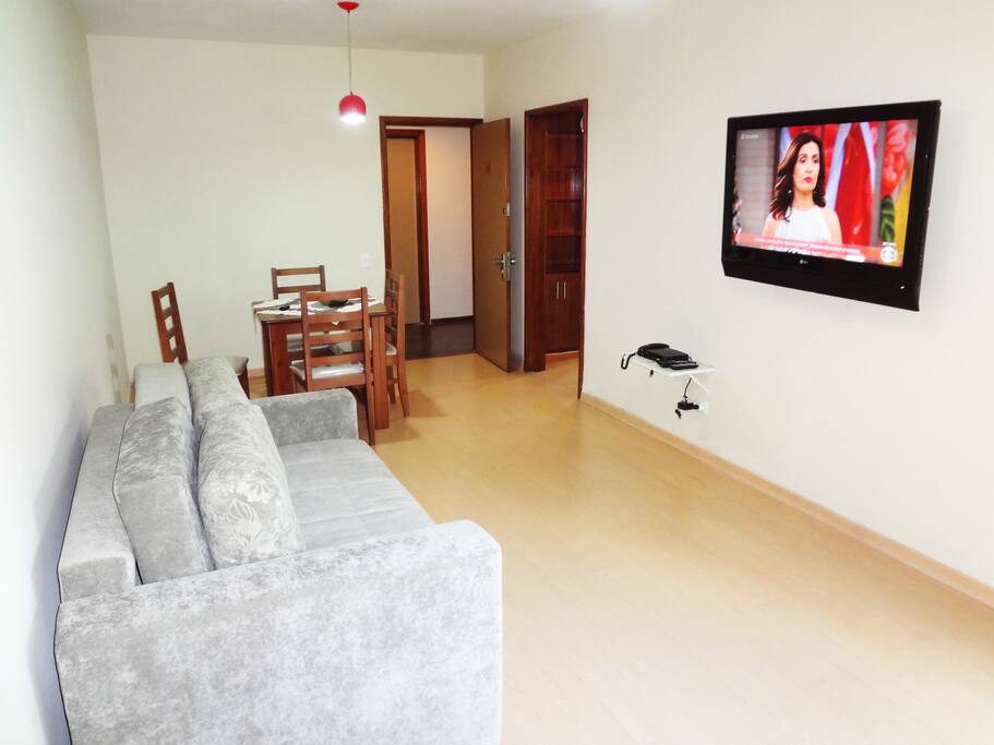 Living room with sleeping sofa, TV, air conditioning