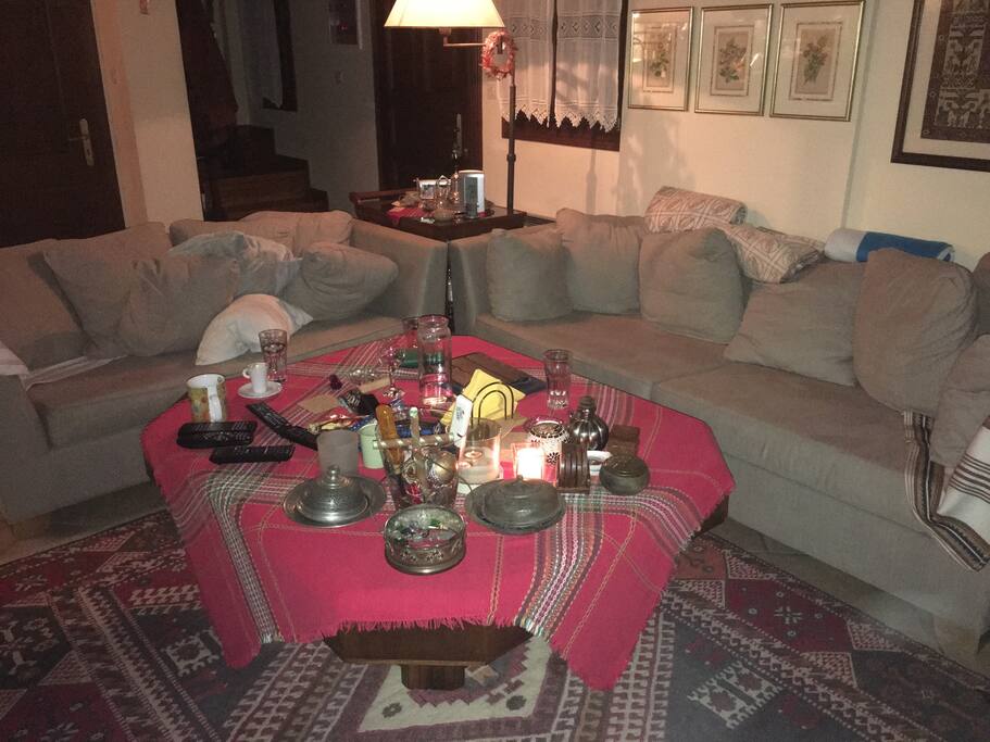 Comfortable and inviting sofa-beds right in front of the wood-burning fireplace.