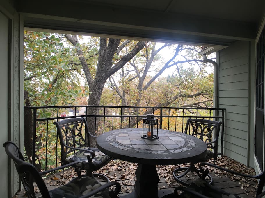 The patio overlooking trees