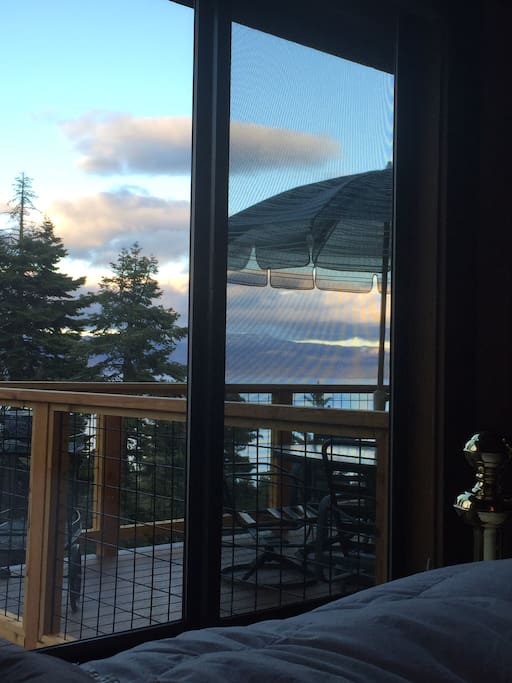 Sunrise view from bed (notice brass bed frame knob)