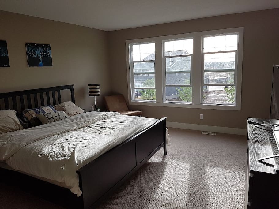 Master bedroom. Wake up to the sunrise (window covers are installed if you prefer the dark).