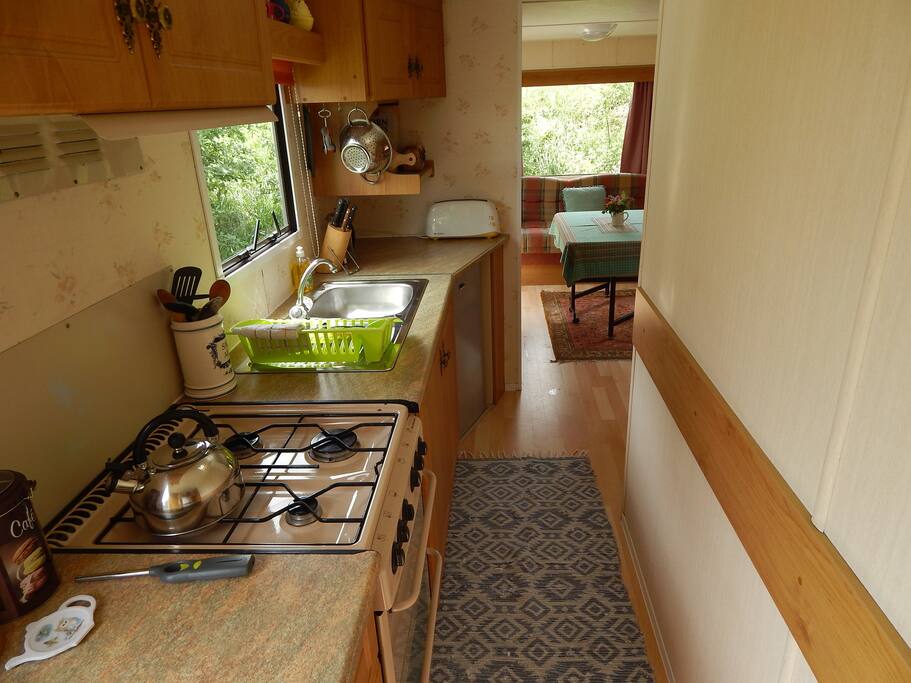 Kitchen with view through to seating area