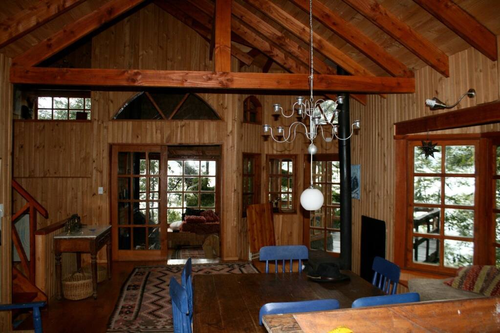 Dining room and living area with fireplace
