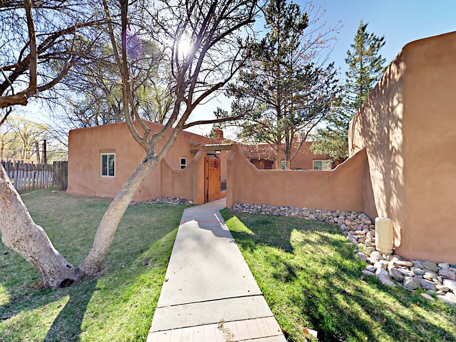 A path through the grounds leads to the front door of your rental. This condo is professionally managed and maintained by TurnKey Vacation Rentals.