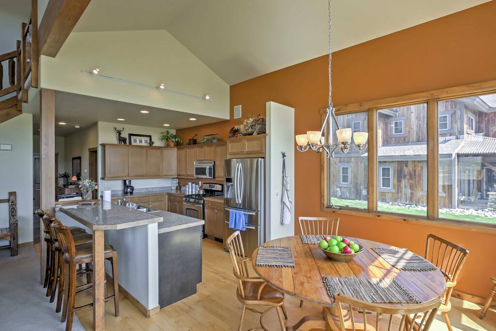 This sleek kitchen comes fully equipped with all the essential appliances.