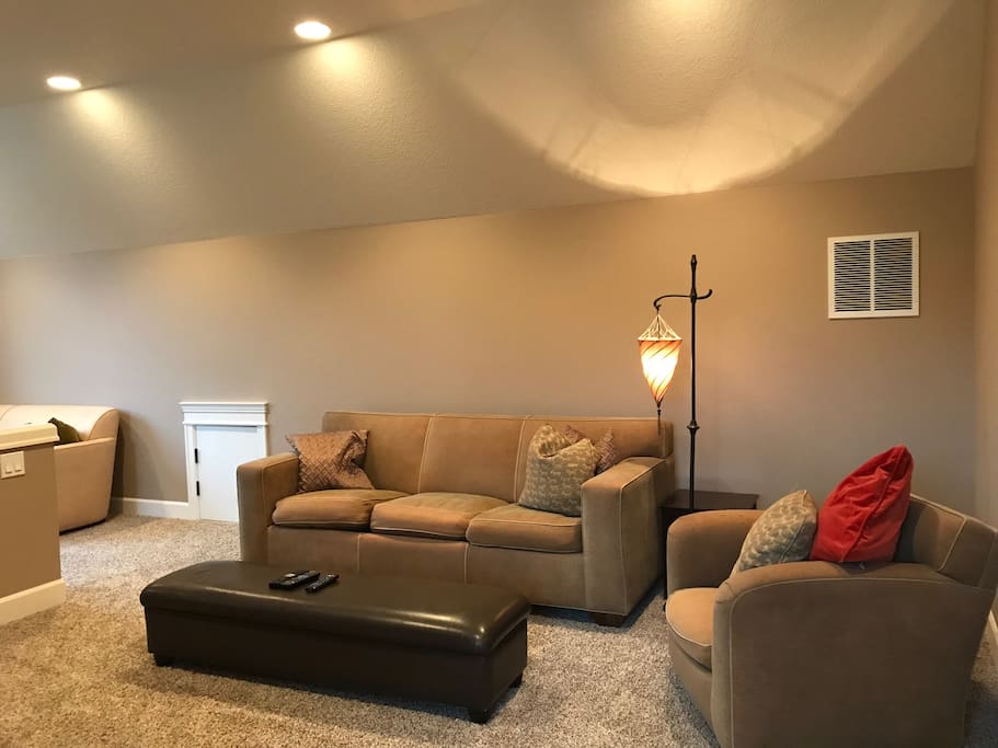 large living room with cable tv and PS4