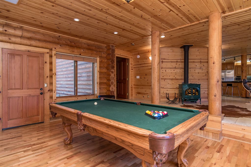 Light a fire in the wood stove and claim a spot at the pool table to show your billiards skills.