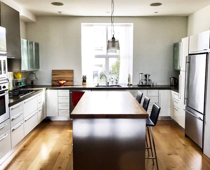 Beautiful gourmet kitchen with high end appliances.
