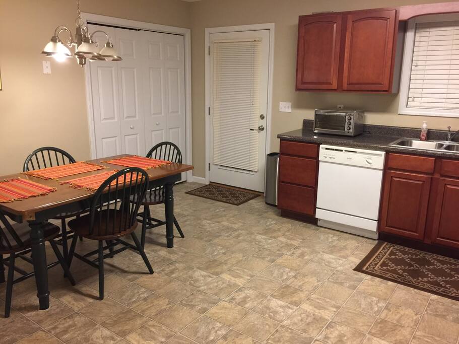 Eat in kitchen seats (4) people laundry services also available