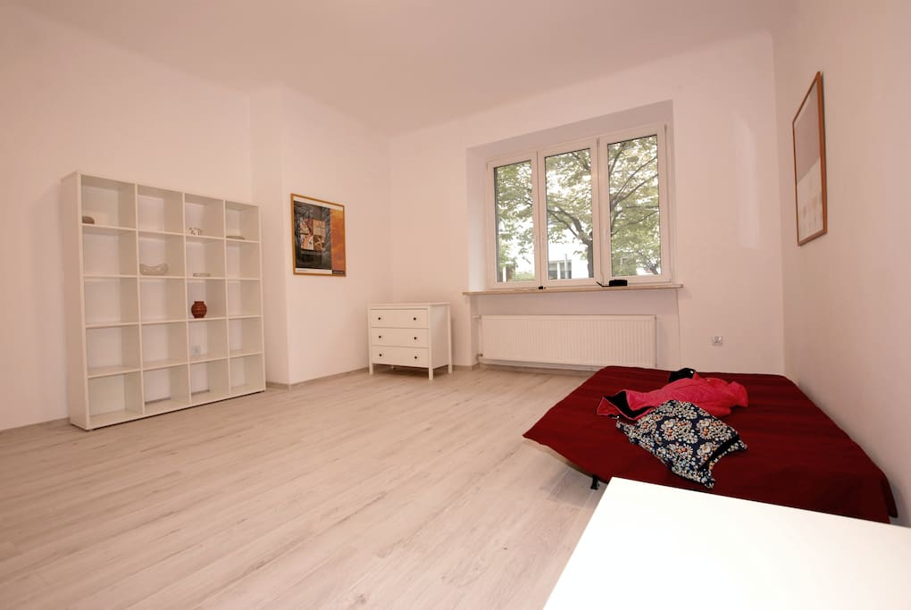 The heart of the flat - spacious living room where you can rest after full day outside.