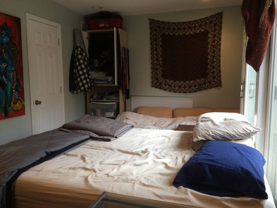 Couch in background shows how spacious the room is.