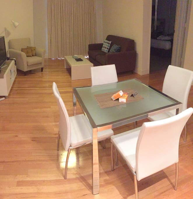 Table setting is a good size and flows to the kitchen on the left and the balcony at the rear. There is good light and airflow. Airconditioned - heating in winter and cooling in summer