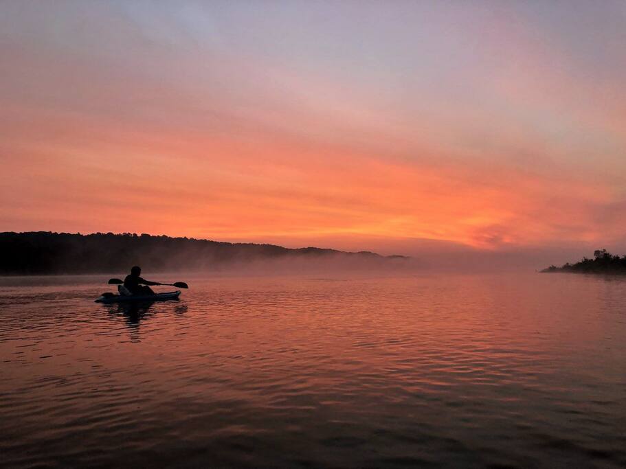Go kayaking at sunrise & catch the mystic river fog
