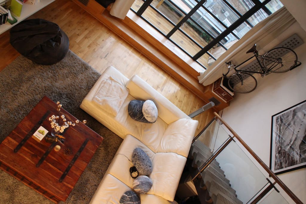 Loft living room with floor-to-ceiling windows