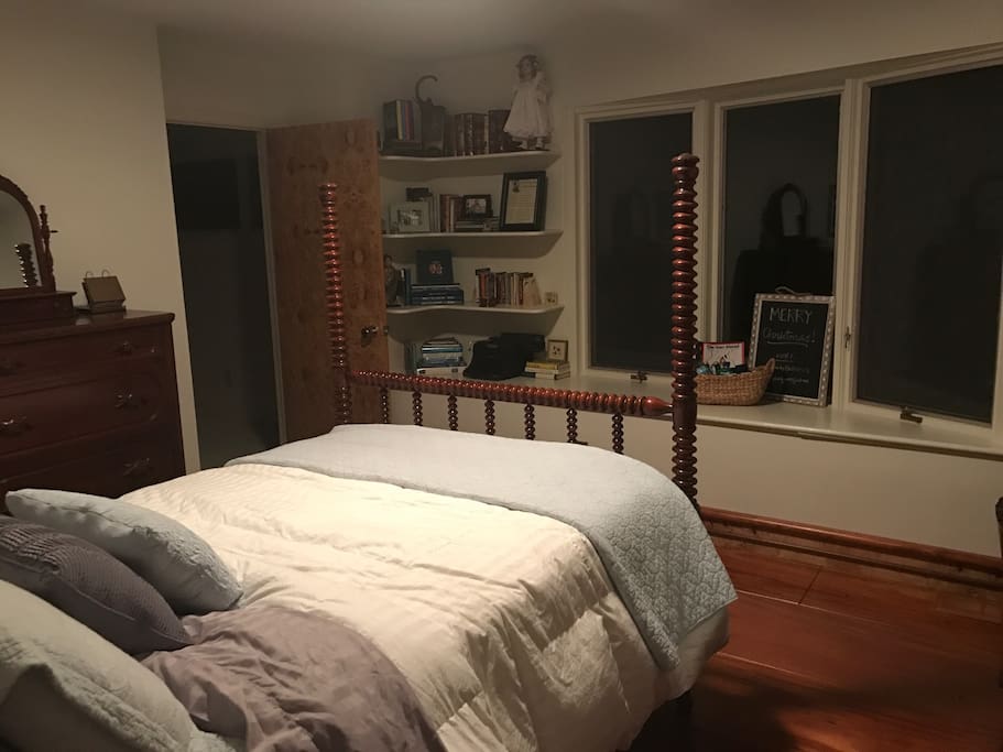 Private guest suite (former master) has views of pond