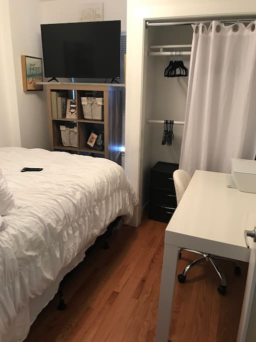 The Bedroom fully equipped with a desk and printer, large TV with a cable box and soft comfortable bed.