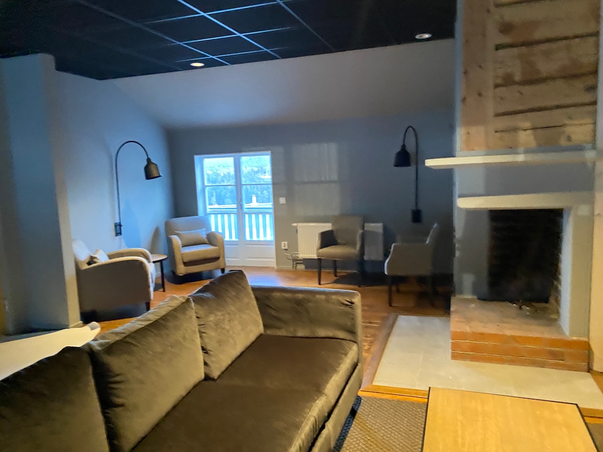 Cozy shared Lounge upstairs outside the apartment where you can socialize with the other residents.