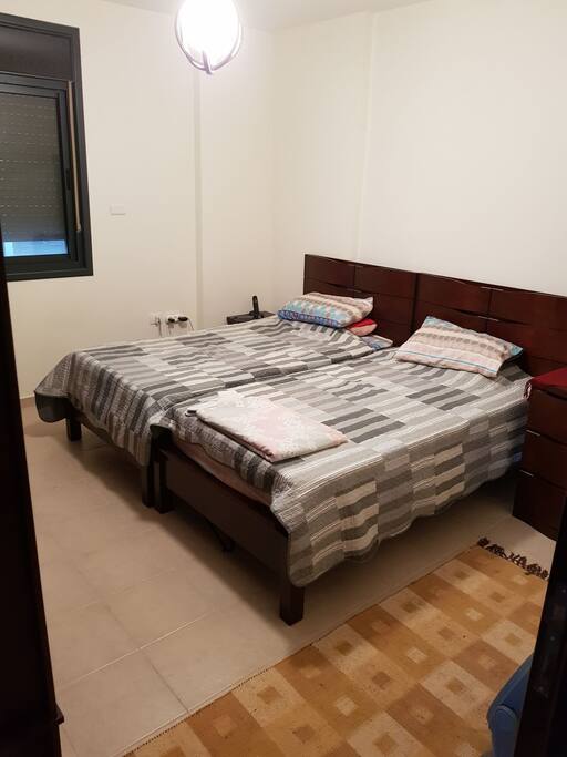 your room with a mirror and wardrobe