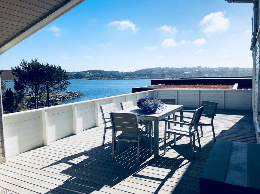 Main sundeck. Relax and see the boats passing. Three sundecks in total at the house.
